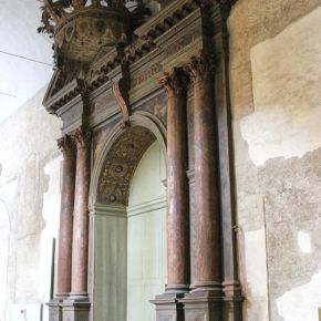 The monumental painted door of the Farnese Theatre